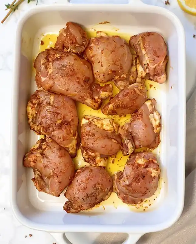 Roast Chicken Thighs in Oven mixing